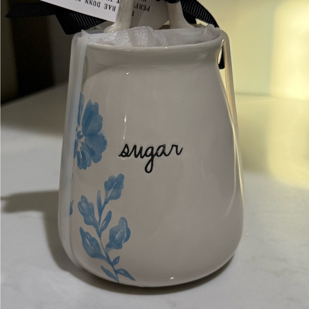 Rae Dunn White Ceramic ‘Sugar’ Jar with Blue Floral Pattern- NWY